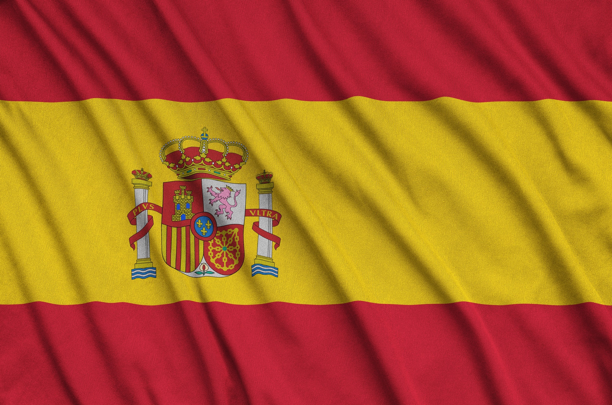spain-flag-is-depicted-on-a-sports-cloth-fabric-with-many-folds-sport-team-waving-banner.jpg
